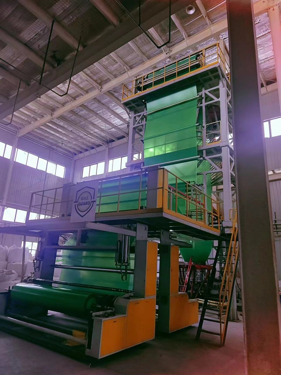 Industrial film material handling system